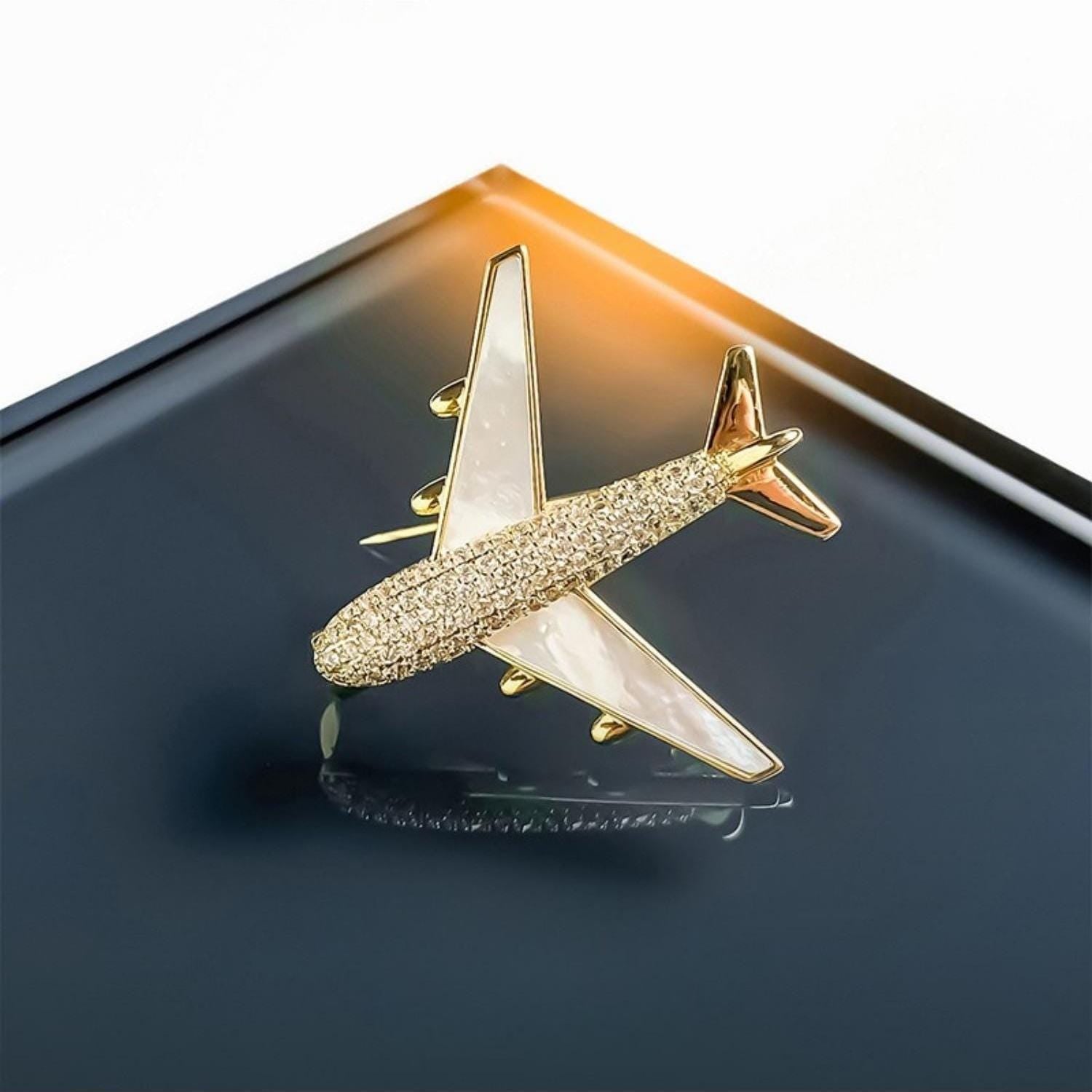 Golden Airplane Brooch