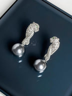 Panther with Pearl Earrings
